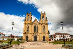 Historical Minor Basilica of Our Lady of the Snows at the central square of the small town of Firavitoba located in the region of Boyaca in Colombia photo