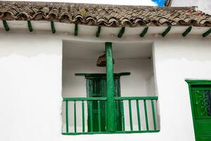 Detail of the beautiful colonial architecture of the streets of the colonial small town of Iza located in the Boyaca department in Colombia photo