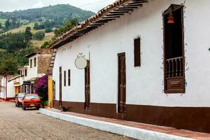 View of the beautiful mountains and streets of the small town of Tibasosa in the region of Boyaca in Colombia photo