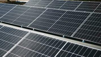 Top view of a new solar farm. Rows of modern photovoltaic solar panels. Renewable ecological source of energy from the sun. Aerial view. video