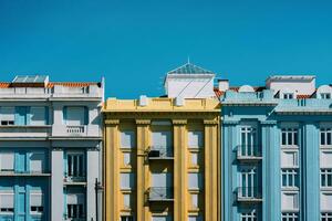 Colourful building facades in Campo Pequeno, Lisbon, Portugal on a sunny day photo