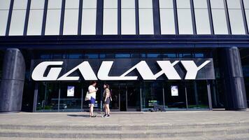 Szczecin, Poland. 7 September 2023. Sign Galaxy. Company signboard Galaxy. photo