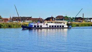 Szczecin, Poland. 7 September 2023. Landscape view and ships on the Odra River from  Chrobry Boulevard. photo