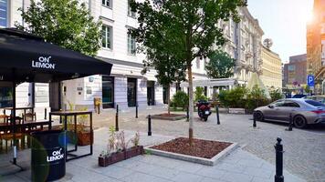 Warsaw, Poland. 10 September 2023. Five Corners Square, where people walk. Tenement houses in the center of the city. photo