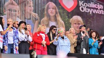 Warsaw Poland. October 1, 2023. Million Hearts March. Artists appeared on the stage at the end of the march route and sang the song photo