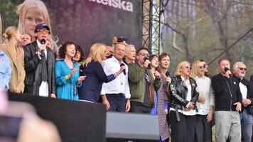 Warsaw Poland. October 1, 2023. Million Hearts March. Artists appeared on the stage at the end of the march route and sang the song photo