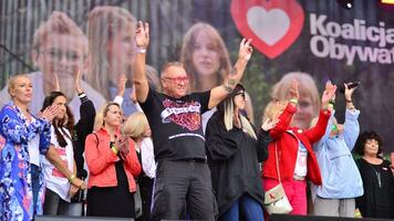 Warsaw Poland. October 1, 2023. Million Hearts March. Artists appeared on the stage at the end of the march route and sang the song photo