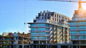 New multistory apartment buildings under construction photo