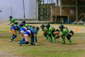 Puebla, Mexico 2023 - Friendly game of women's American football in Mexico on a flat field on a sunny day photo