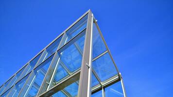 Modern building glass roof metal frame construction. Metal structure supporting glass roof. photo