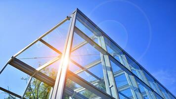 Modern building glass roof metal frame construction. Metal structure supporting glass roof. photo