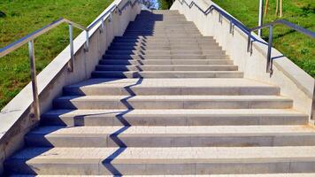 Abstract modern concrete stairs to building photo