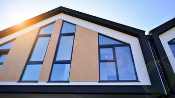 New build single family house. Suburban area with modern geometric family house. photo