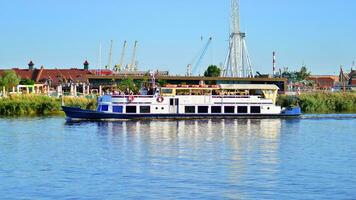 Szczecin, Poland. 7 September 2023. Landscape view and ships on the Odra River from  Chrobry Boulevard. photo