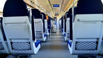 Warsaw, Poland. 7 September 2023. Interior of a passenger train. Empty chairs in the wagon. PKP Intercity. photo