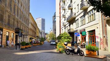 Warsaw, Poland. 10 September 2023. Five Corners Square, where people walk. Tenement houses in the center of the city. photo