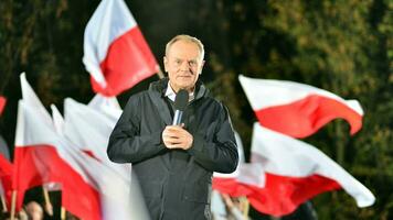 Warsaw, Poland. 9 October 2023. Donald Tusk speaks at an election rally after a televised debate on government television at the end of the campaign. photo