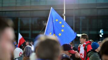 Warsaw, Poland. 9 October 2023. Supporters of Donald Tusk are waiting for the arrival of their favorite in front of the television studio photo