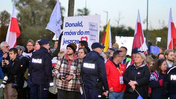 Warsaw, Poland. 9 October 2023. Supporters of Donald Tusk are waiting for the arrival of their favorite in front of the television studio photo