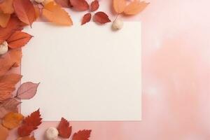 Autumn leaves on peach table, white sheet of paper. AI Generated photo