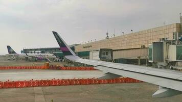 Guadalajara Jalisco Mexico 2023 Guadalajara International Airport aircraft runway indoor building and gate Mexico. video