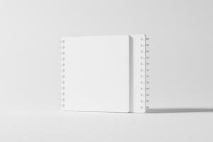 Square Spiral Notebook 3D Rendering White Blank Mockup photo