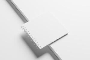 Square Spiral Notebook 3D Rendering White Blank Mockup photo