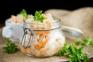 Sauerkraut with carrots and spices in a bowl photo