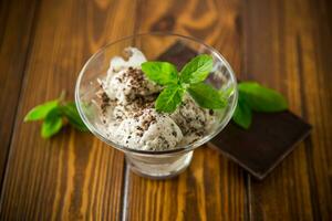 homemade ice cream with pieces of grated dark chocolate photo