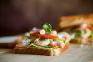 sandwich with lettuce and shrimp. photo