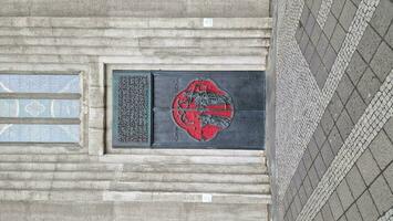 Front door of hallgrimskirkja church circa March 2023, artistic entrance of sacred cathedral of hallgrimur with concrete stone architecture. Famous lutheran building represents icelandic religion. photo