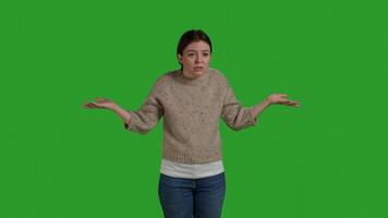 Front view of mad woman being upset on isolated backdrop, acting furious and displeased in studio. Young person in conflict showing disagreement and disapproval, negative emotions. Close up. photo