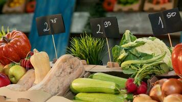 Natural organic fruits and vegetables on farmers market counter photo