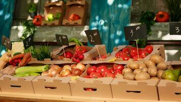 Natural colorful fresh fruits and veggies on display at farmers market photo