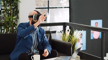 Analyst creating 3d project with vr headset, plnning development strategy with interactive vision gadget. Professional consultant in coworking space, unicorn business technology. photo