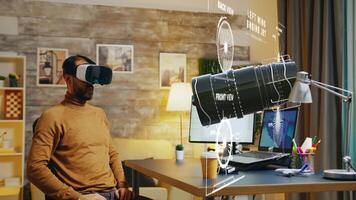 Specialist wearing VR headset using AR technology to visualize final result, prototyping jet engine model design on 3D manufacturing software. Professional developing industrial mechanism parts photo