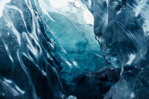 Massive ice chucks inside crevasse used for glacier hiking, vatnajokull ice mass in scandinavian region. Impressive icy blocks inside caves and tunnels, global warming concept. photo