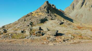 Massive nordic vestrahorn mountain chain on stokksnes peninsula, icelandic landscapes. Beautiful black sand beach in arctic iceland, panoramic view of scandinavian nordic nature. photo