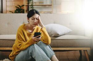 woman sit Depression Dark haired  pensive glance Standing by window and anxiety Copy space. at home photo