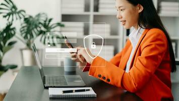 Cyber security concept, Login, User, identification information security and encryption, secure access to user's personal information woman using smart phone and tablet in office photo