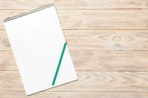 Blank notebook with pen on white background. Back to school and education concept photo