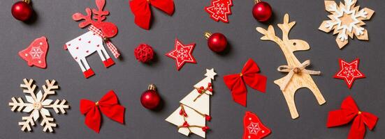 Christmas black background with holiday toys and decorationsBanner . Happy New Year concept photo