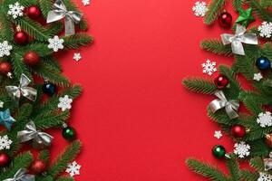 Christmas background with fir branches and Christmas decor. Top view, copy space for text photo