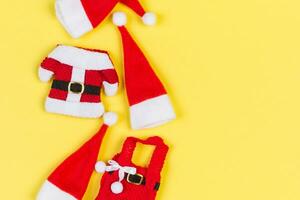 Top view od stylish red Santa hats Banner on colorful background. Merry Christmas concept with copy space photo