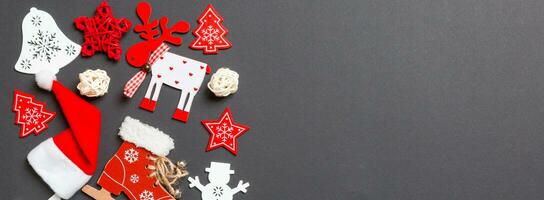 New Year decorations on black background. Banner Merry Christmas concept with empty space for your design photo