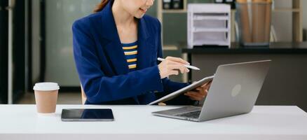 Working Process in Modern Office. Young Woman Account Manager Working at Table with New Business Project. Typing keyboard Laptop. Horizontal. photo