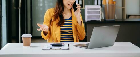 Working Process in Modern Office. Young Woman Account Manager Working at Table with New Business Project. Typing keyboard Laptop. Horizontal. photo