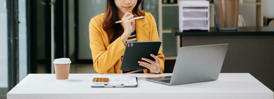 Working Process in Modern Office. Young Woman Account Manager Working at Table with New Business Project. Typing keyboard Laptop. Horizontal. photo