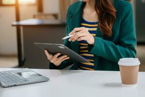 Working Process in Modern Office. Young Woman Account Manager Working at Table with New Business Project. Typing keyboard Laptop. Horizontal. photo