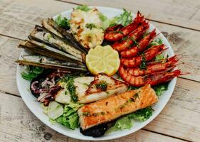 Typical seafood barbecue from the European Mediterranean coast photo